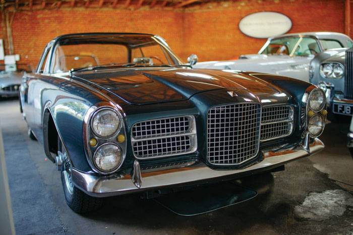 A 1963 Facel Vega Facel II in dark grey is for sale in a dealership. If you are a classic car enthusiast looking for muscle cars, classic trucks, or antique cars, buying or selling with the following sites are great places to start.