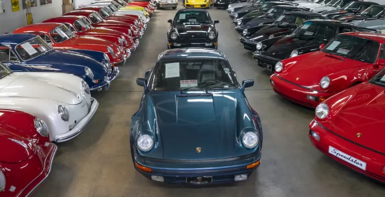 A classic car dealership garage. Many dealerships opt for open auto transport to reduce costs.